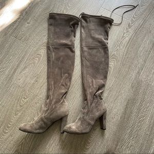 Thigh high heeled boot